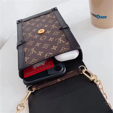 louis vuitton phone pouch.